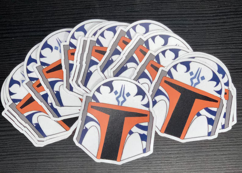 We’d Love to See It matte die cut sticker, Mandalorian style helmet with Ahsoka inspired blue and white markings