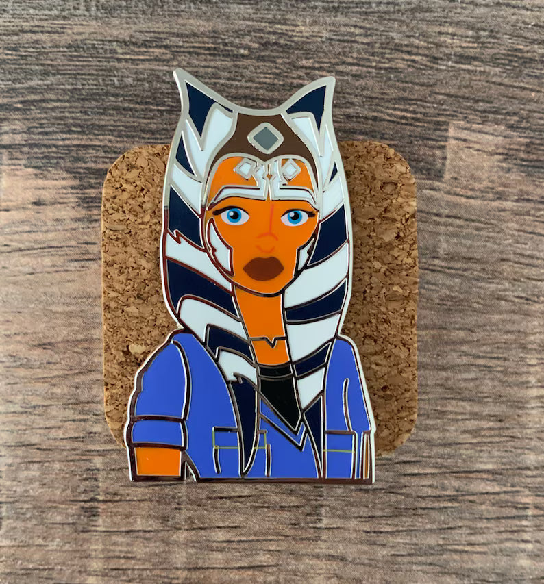 We Love a Little Jumpsuit Moment Ahsoka enamel pin in her blue season seven jumpsuit
