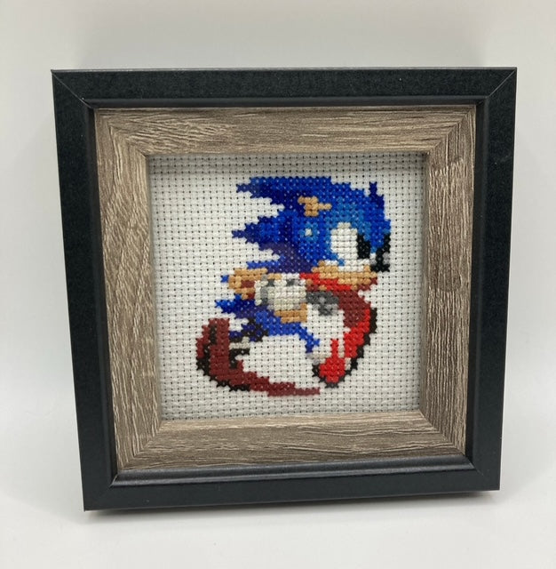 Framed Handmade Cross-Stitched Characters